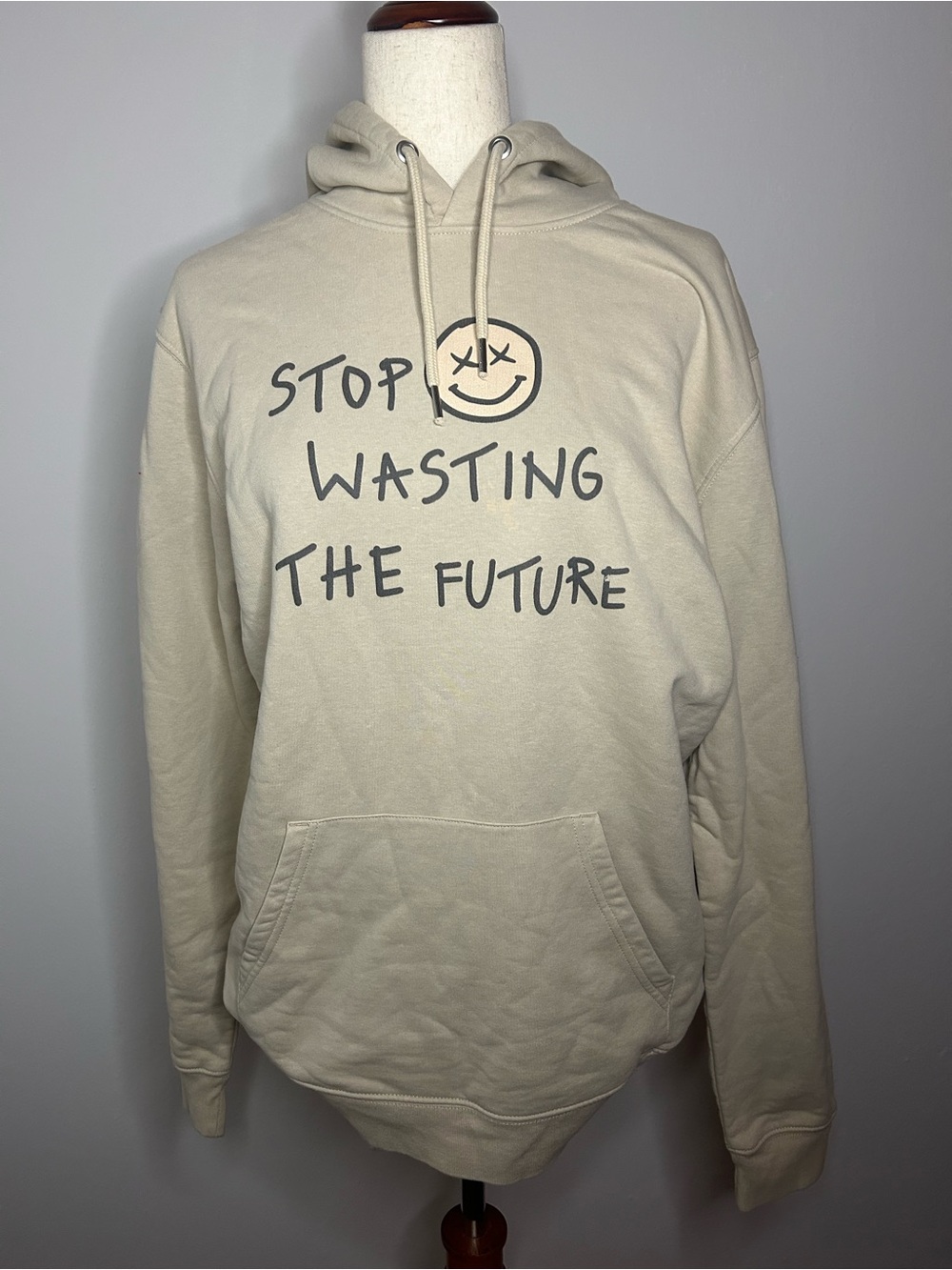 BROKEN PLANET MARKET Women's Cream Graphic Hoodie - 'Stop Wasting The Future'